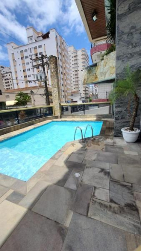 074 Cantinho da Praia - 1 quarto c/ varanda - 200 m da praia - WI FI e com área de lazer - PISCINA e Salão de Jogos e ESTACIONAMENTO GRATUITO